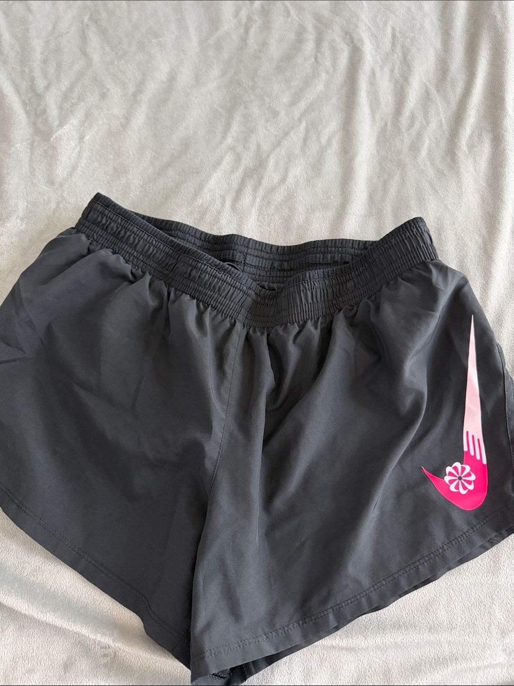 Nike Women's Black Athletic Shorts with Pink Accent
